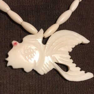 Carved bone tropical Fish pendant necklace